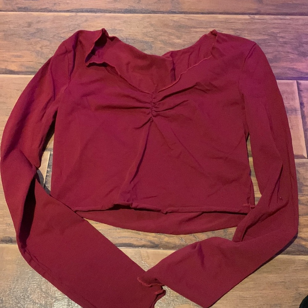 red cinched long sleeve top